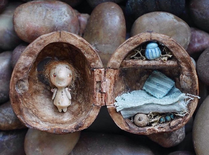 Good things in small packages: Miniature dolls that fit in a walnut shell - PHOTOS